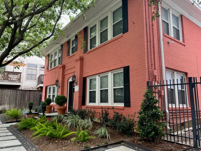 a front view of a multi story residential apartment building