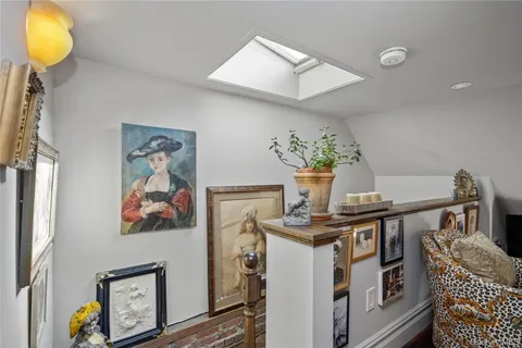 a picture of a bathroom with sink and mirror