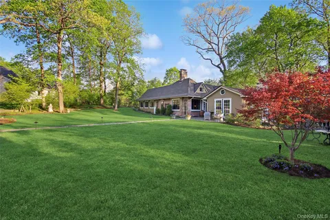a backyard of a house with lots of green space