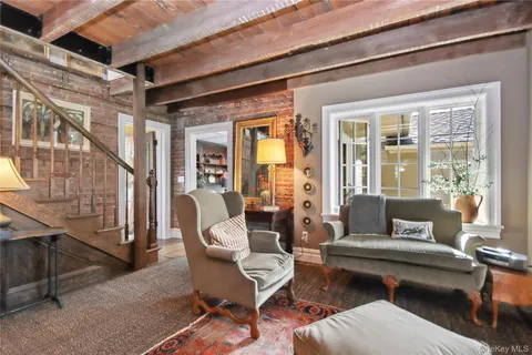 a outdoor living space with patio furniture and a potted plant