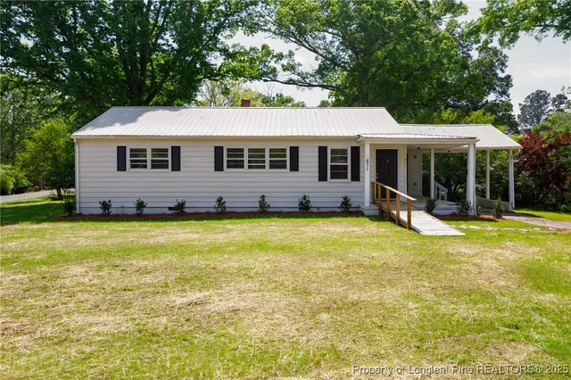 a view of a house with a swimming pool