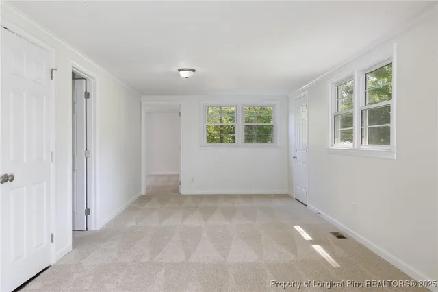 an empty room with windows