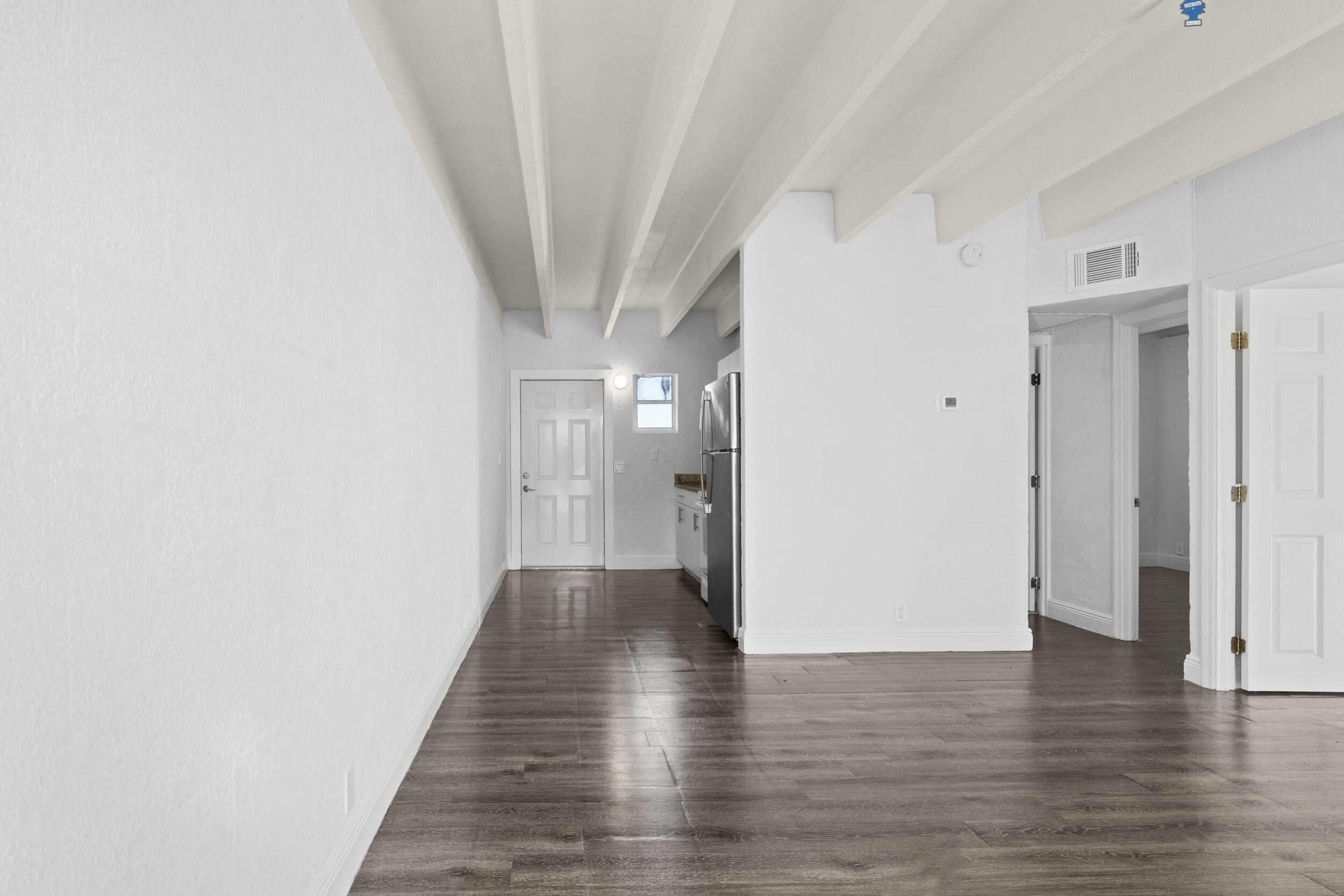812 19th Street, Unit 3 West Palm Beach, FL 33407 - Photo 2 of 11 a view of a hallway with wooden floor