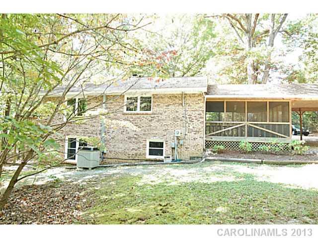 5413 Stone Mill Road Waxhaw, NC 28173 - Photo 2 of 16 front view of a house with a yard