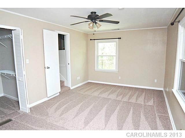 5413 Stone Mill Road Waxhaw, NC 28173 - Photo 12 of 16 a view of an empty room with a window