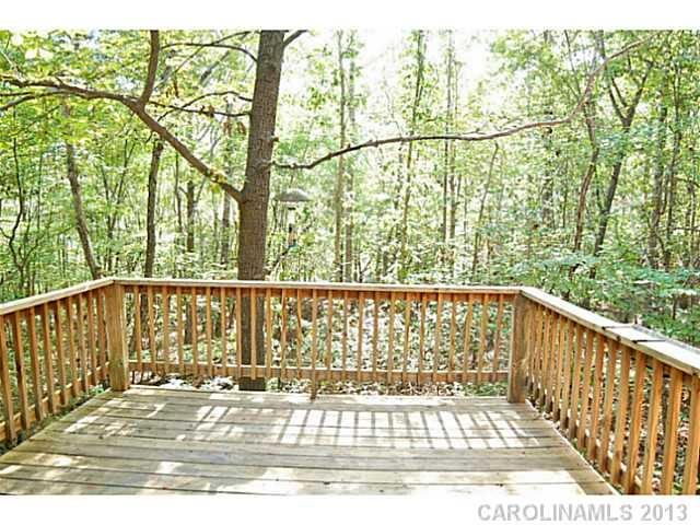 5413 Stone Mill Road Waxhaw, NC 28173 - Photo 15 of 16 a view of a balcony with wooden floor and fence