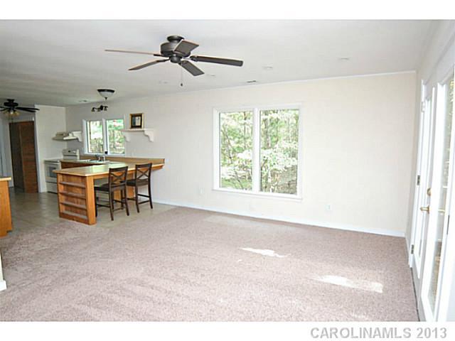 5413 Stone Mill Road Waxhaw, NC 28173 - Photo 6 of 16 a view of workspace with furniture and a window