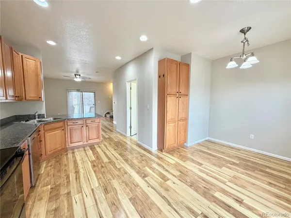 a spacious bathroom with a large tub and sink