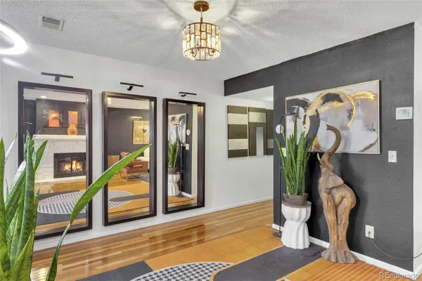 a view of an entryway and livingroom with furniture