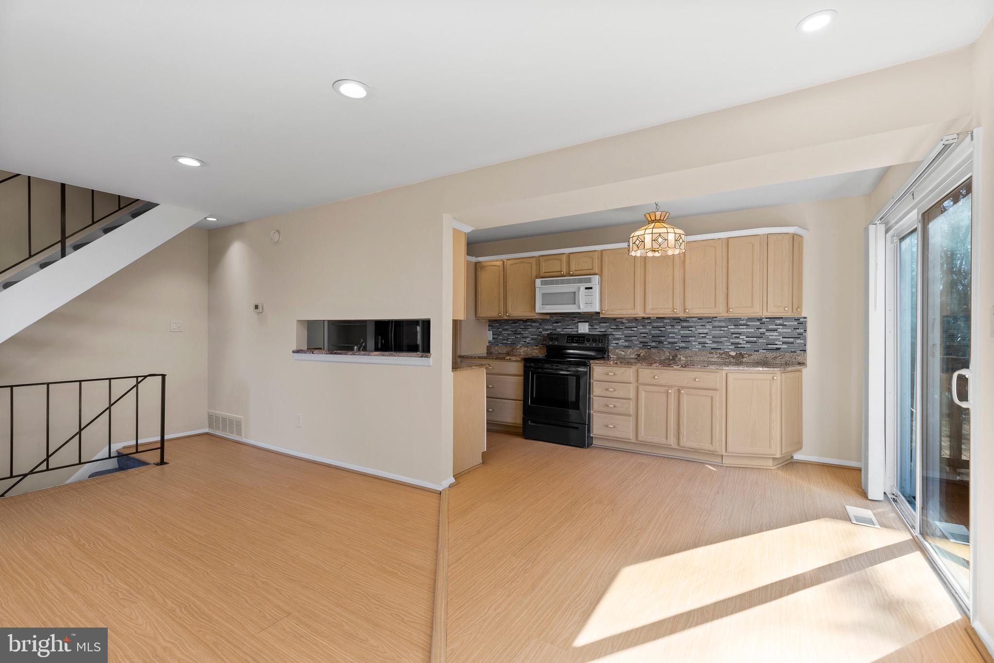 38 Deepspring Court Reisterstown, MD 21136 - Photo 2 of 17 a large kitchen with cabinets and stainless steel appliances