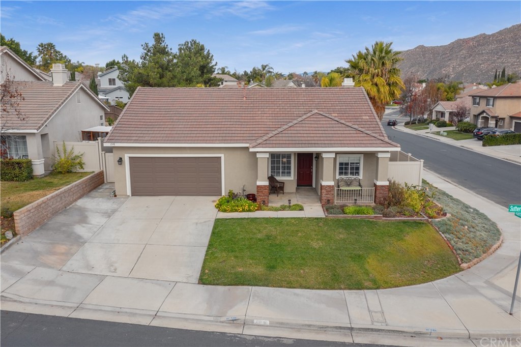 1398 Sutherland Drive Riverside, CA 92507 - Photo 1 of 1 a view of a house with a backyard porch and sitting area