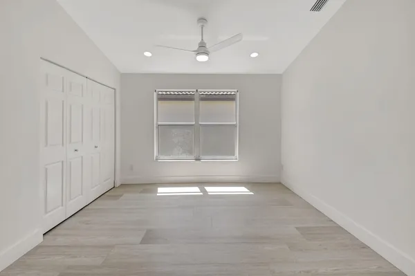 a view of a lake with a city