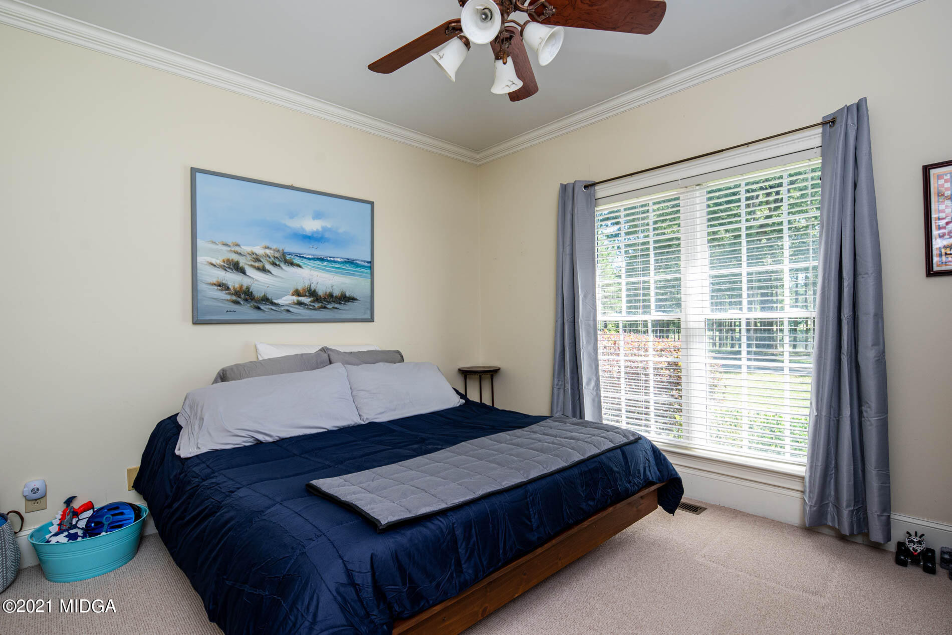 2138 Midway Road Lizella, GA 31052 - Photo 25 of 47 a bedroom with a bed and a window
