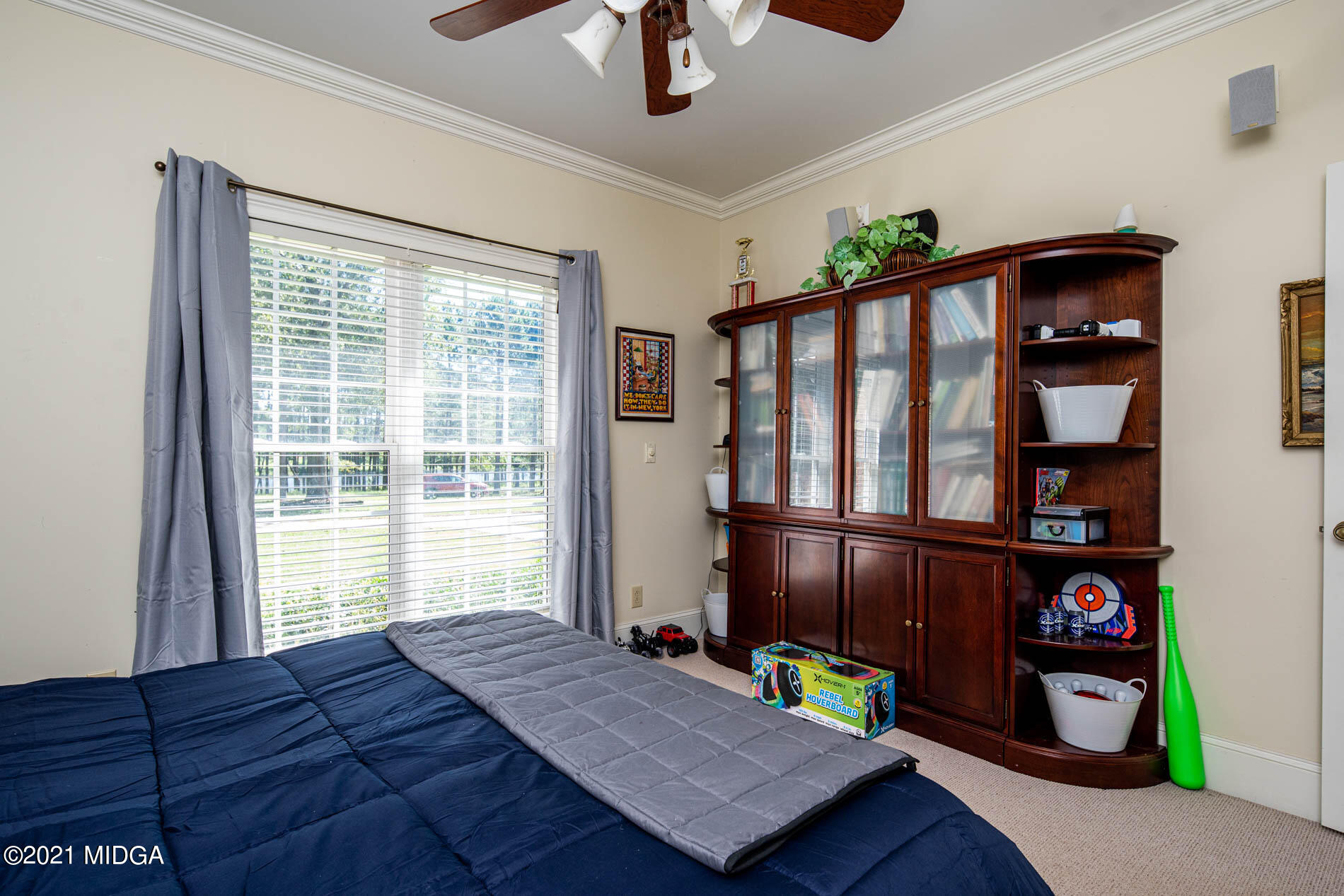 2138 Midway Road Lizella, GA 31052 - Photo 26 of 47 a bedroom with furniture and a window