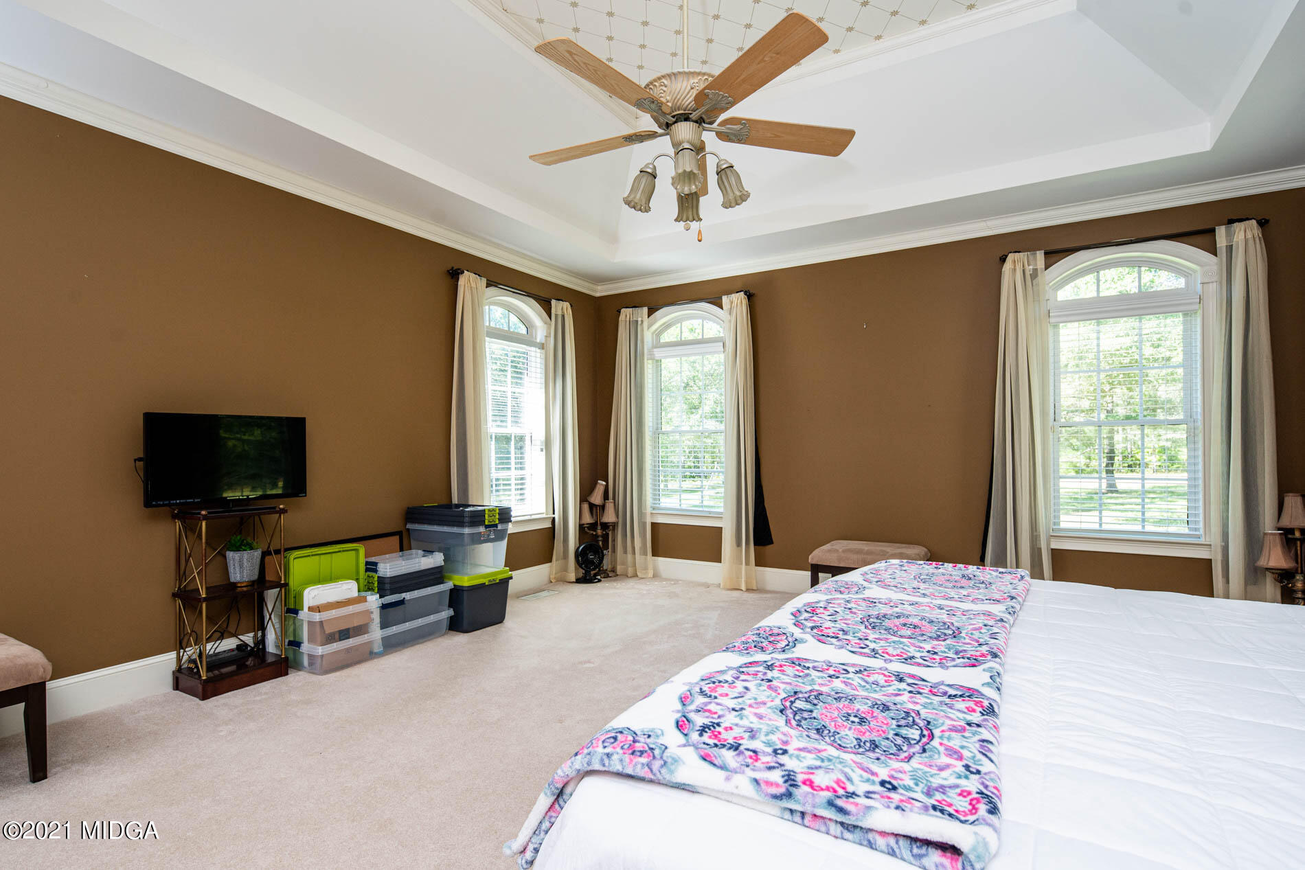2138 Midway Road Lizella, GA 31052 - Photo 32 of 47 a bedroom with a bed and a flat screen tv