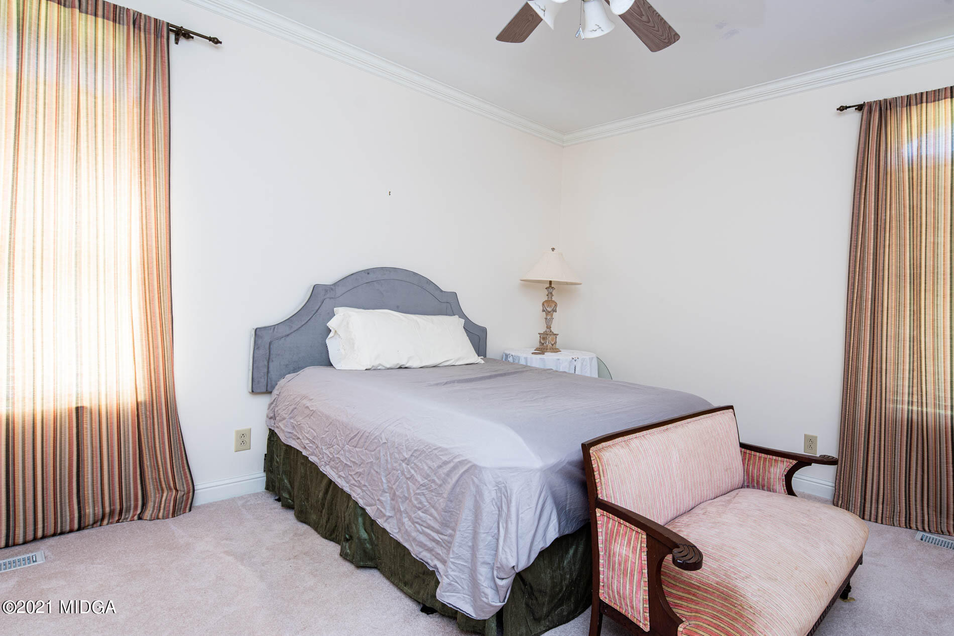 2138 Midway Road Lizella, GA 31052 - Photo 34 of 47 a bedroom with a bed and wooden floor
