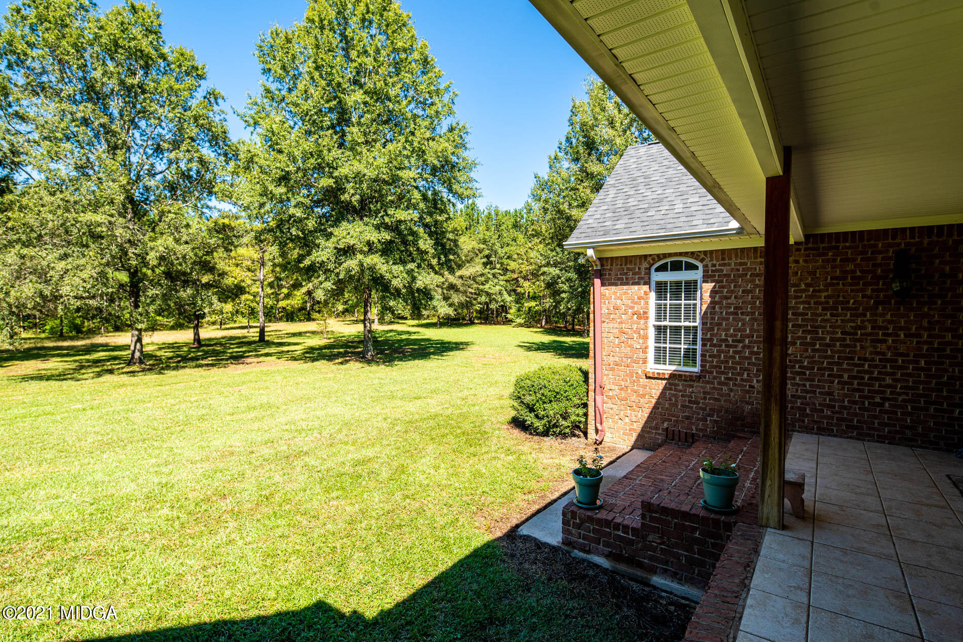 2138 Midway Road Lizella, GA 31052 - Photo 40 of 47 a front view of a house with a yard