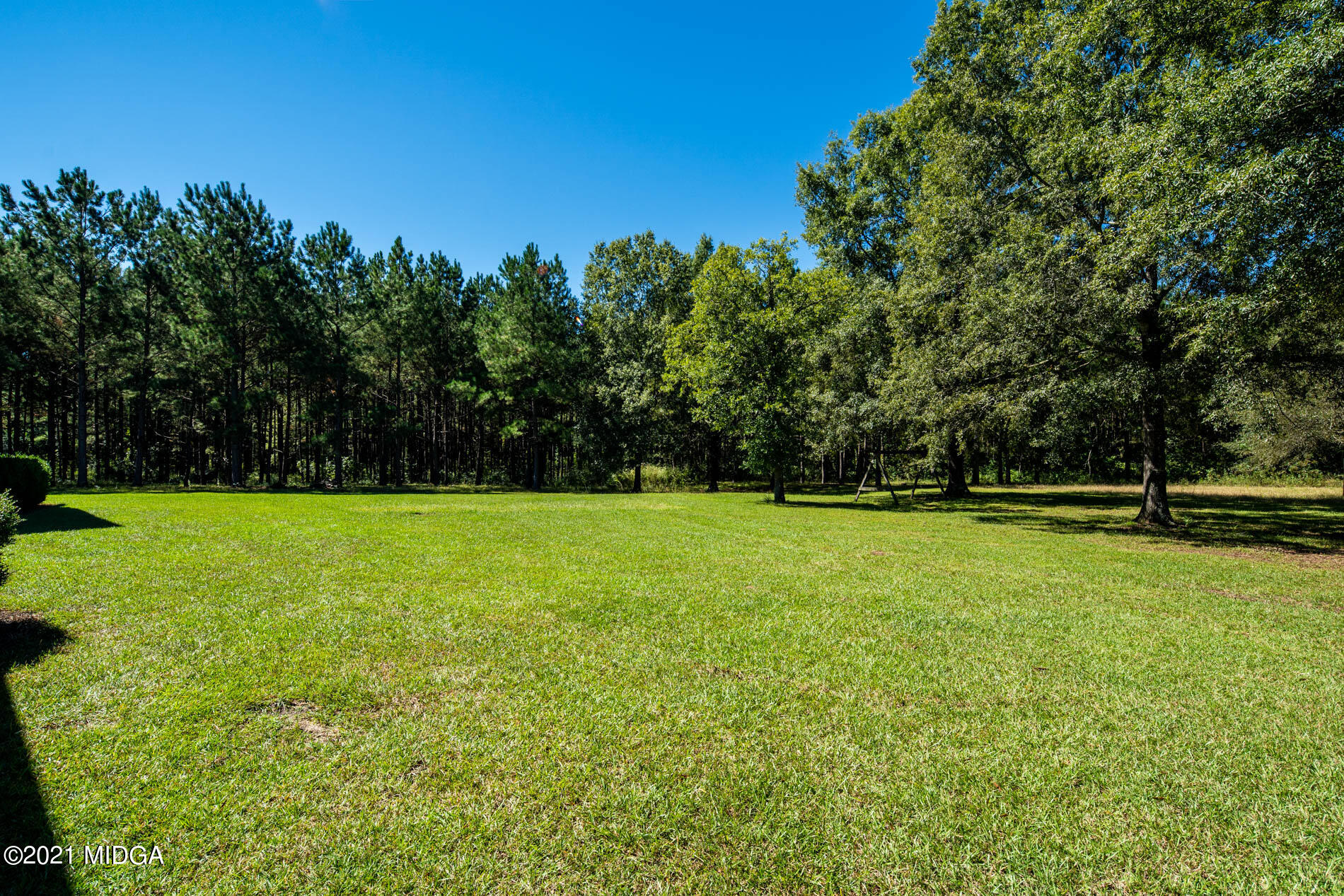 2138 Midway Road Lizella, GA 31052 - Photo 41 of 47 a view of a green field