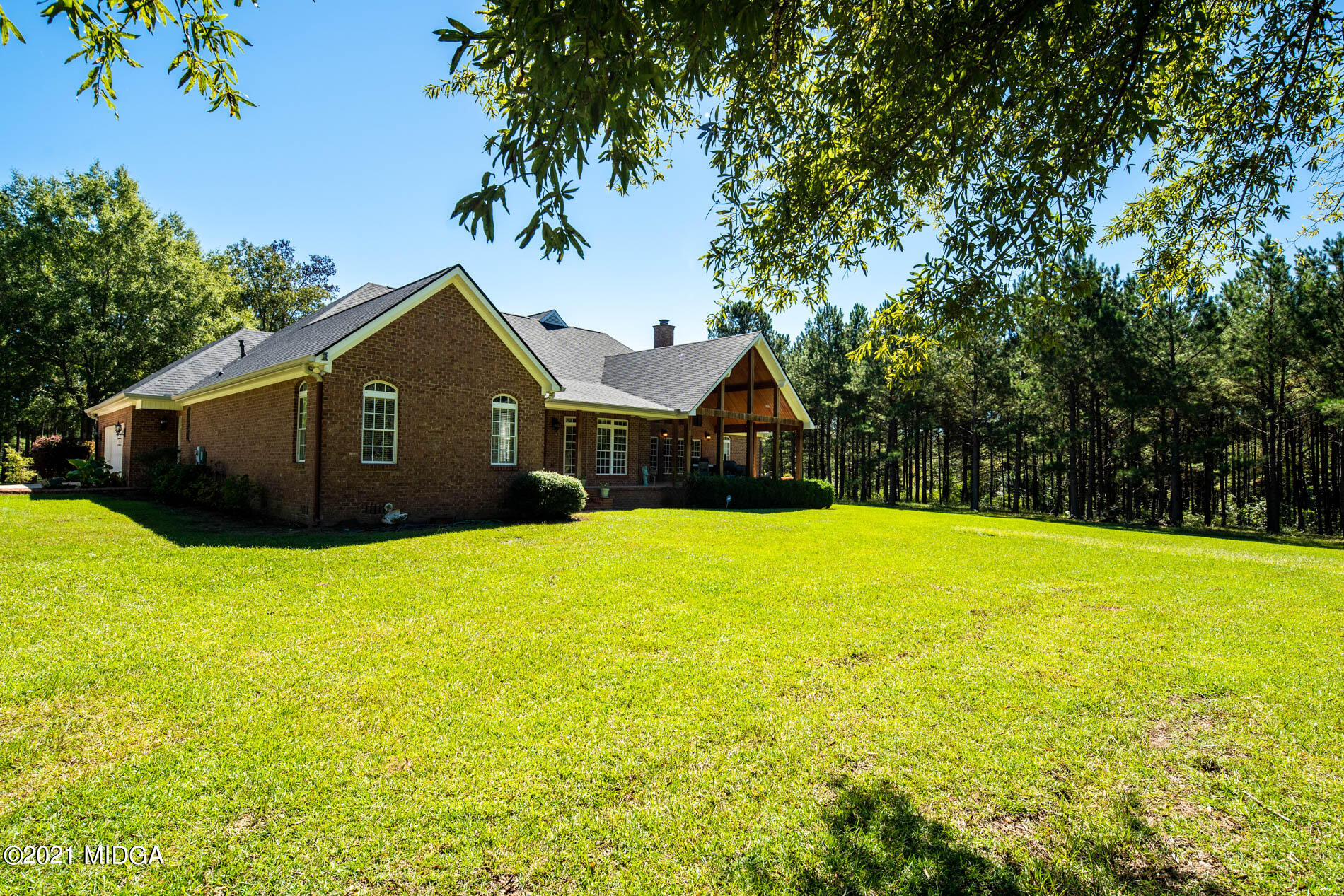 2138 Midway Road Lizella, GA 31052 - Photo 42 of 47 a front view of a house with a yard