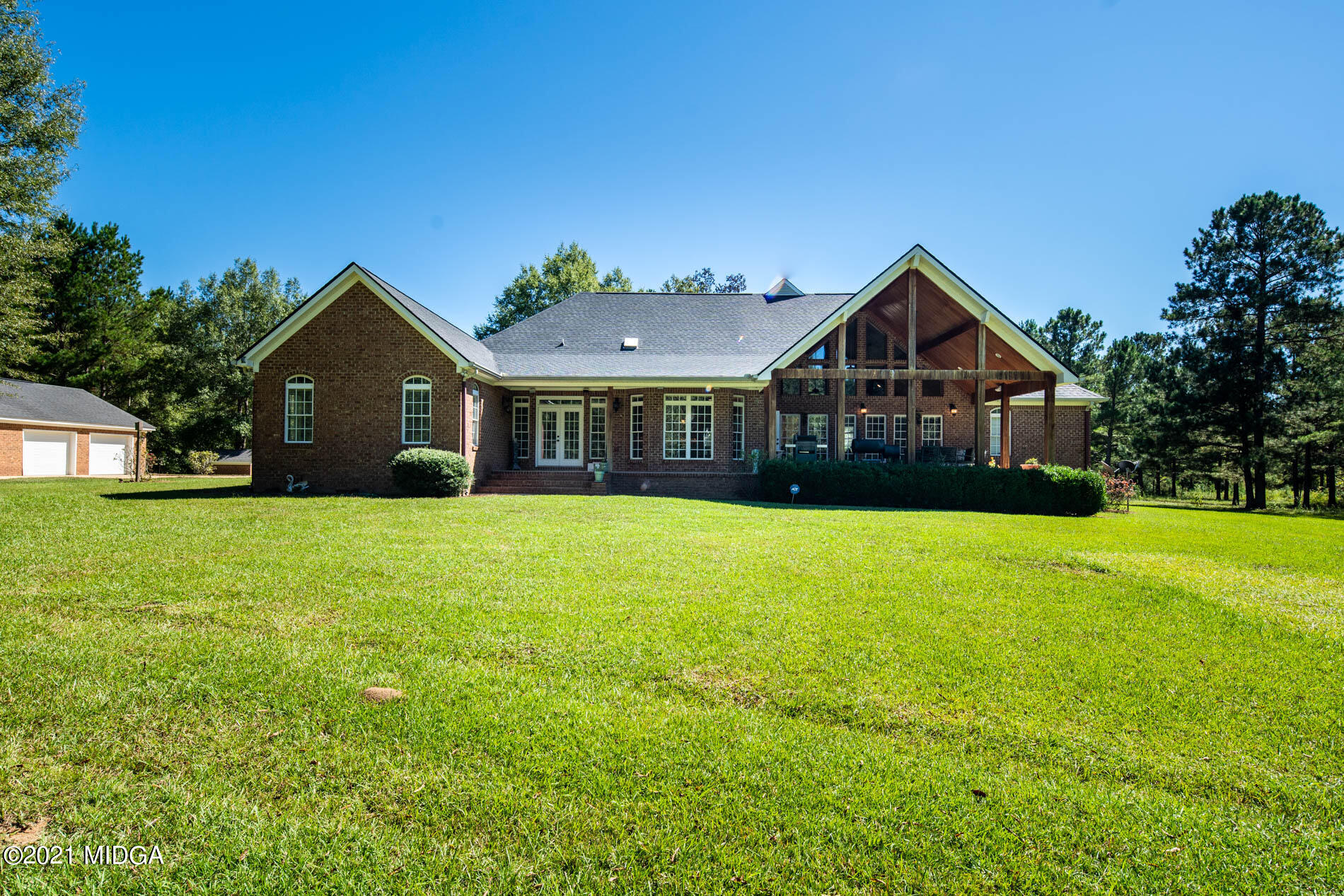 2138 Midway Road Lizella, GA 31052 - Photo 43 of 47 a front view of a house with yard