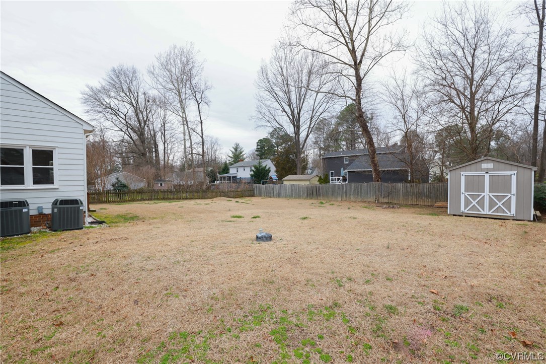 8226 Lucille Road Mechanicsville, VA 23111 - Photo 44 of 48 a view of a yard with a large tree