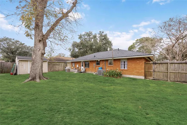 a front view of house with garden