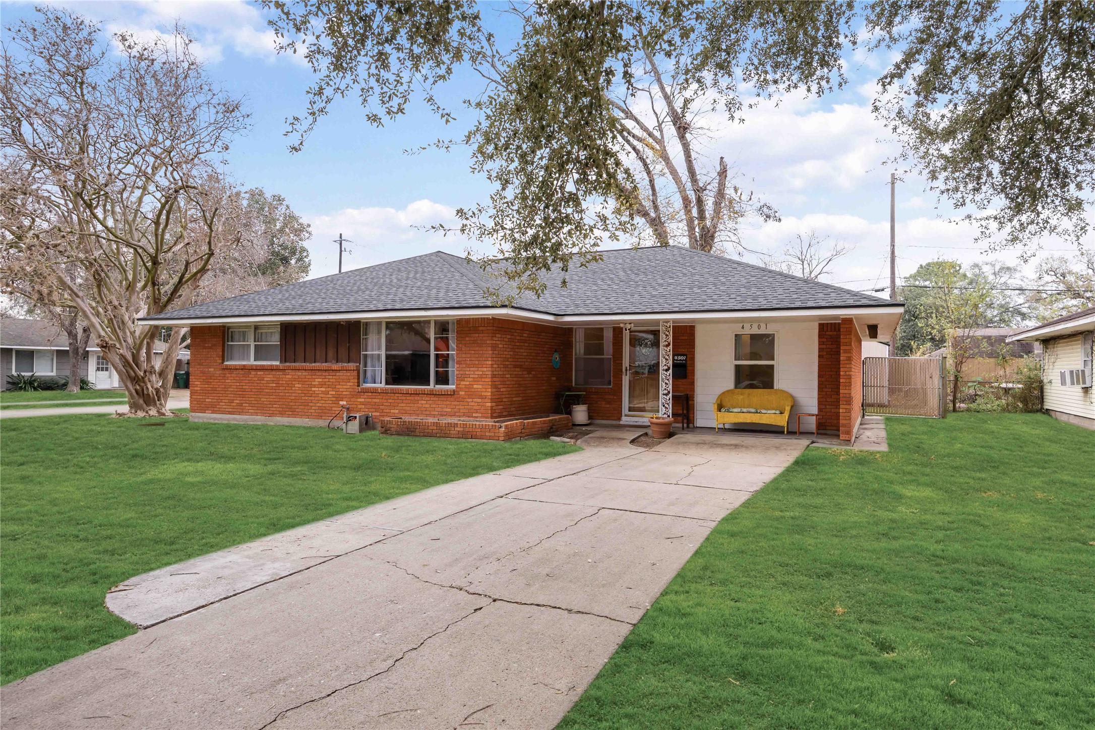 4501 Verdome Lane Houston, TX 77092 - Photo 26 of 27 a front view of a house with a yard and trees