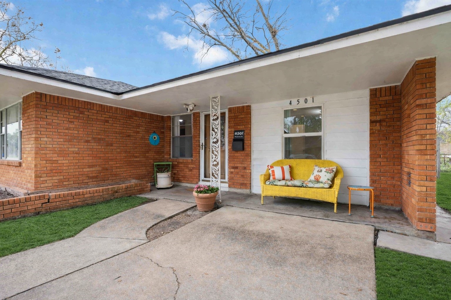 4501 Verdome Lane Houston, TX 77092 - Photo 3 of 27 a view of a patio with a table and chairs and potted plants