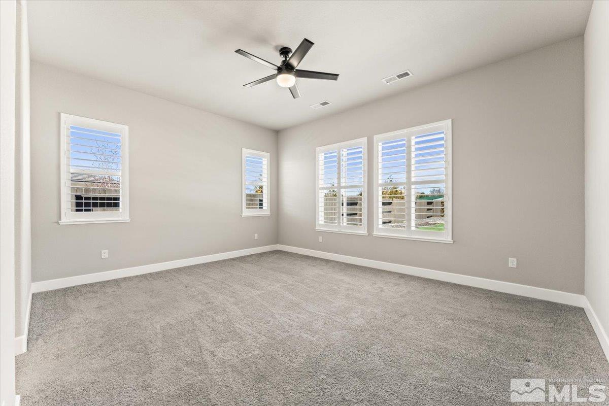1273 Crawford Crk Drive Reno, NV 89521 - Photo 14 of 39 a view of an empty room with a window