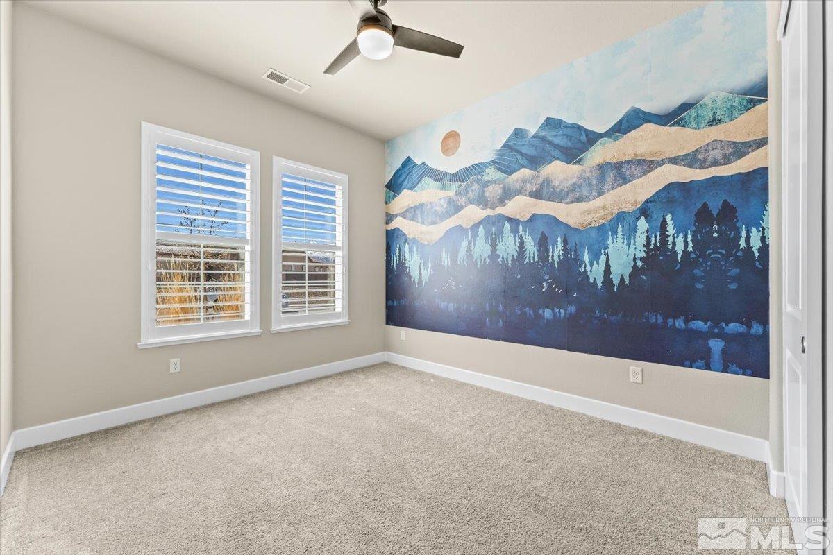1273 Crawford Crk Drive Reno, NV 89521 - Photo 18 of 39 a view of an empty room with a window