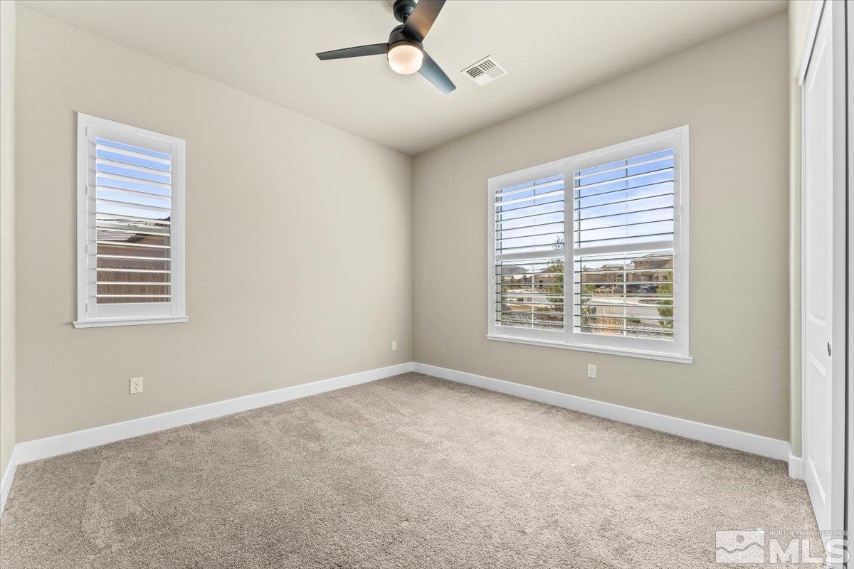 1273 Crawford Crk Drive Reno, NV 89521 - Photo 19 of 39 a view of an empty room with a window
