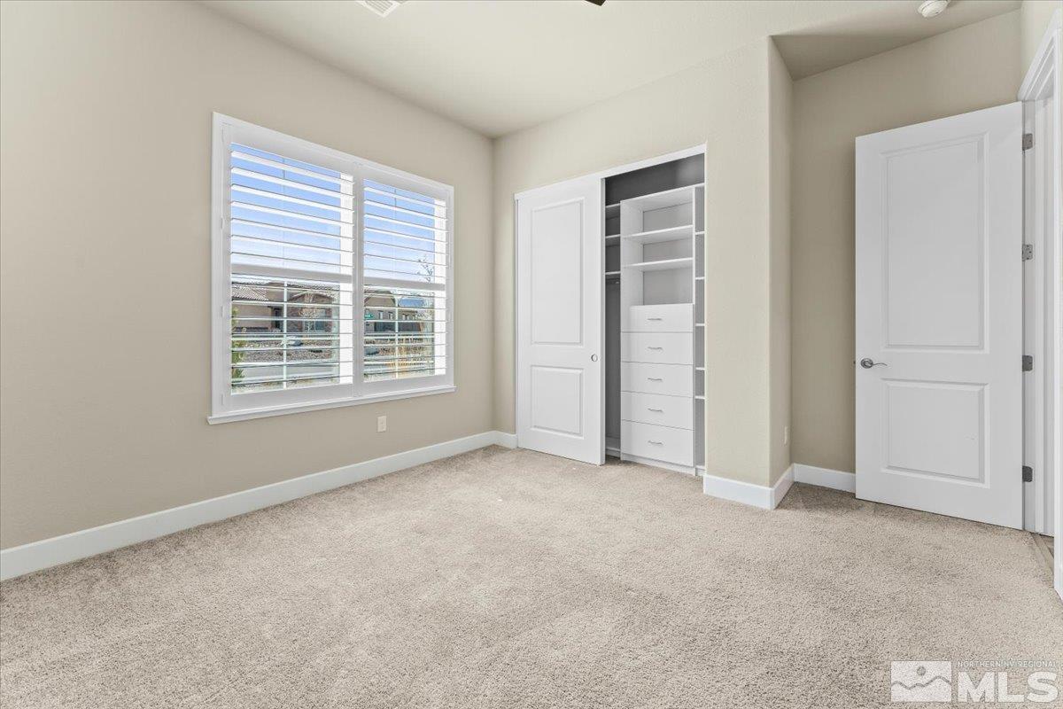 1273 Crawford Crk Drive Reno, NV 89521 - Photo 20 of 39 an empty room with windows