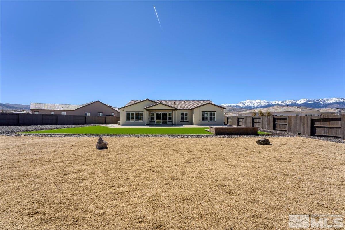 1273 Crawford Crk Drive Reno, NV 89521 - Photo 32 of 39 a view of a house with a yard