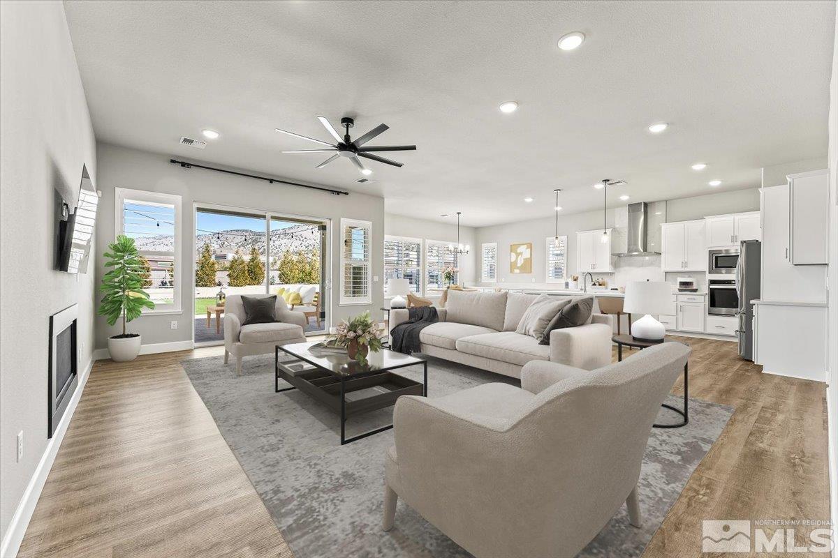 1273 Crawford Crk Drive Reno, NV 89521 - Photo 4 of 39 a living room with furniture and a large window