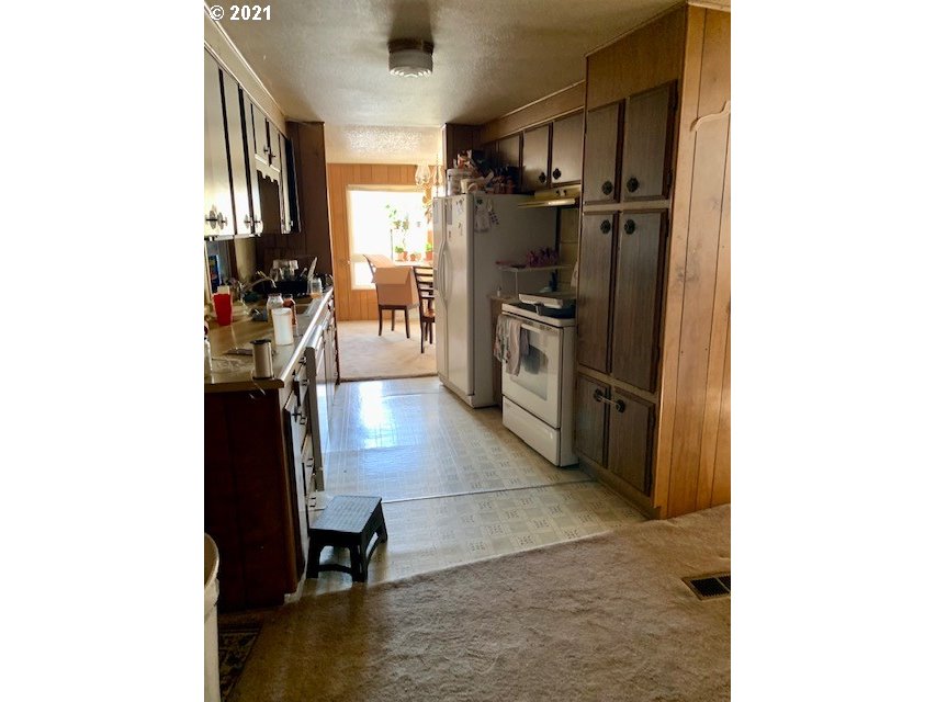 46488 Brahman Way Pendleton, OR 97801 - Photo 8 of 15 a kitchen with a refrigerator and a sink