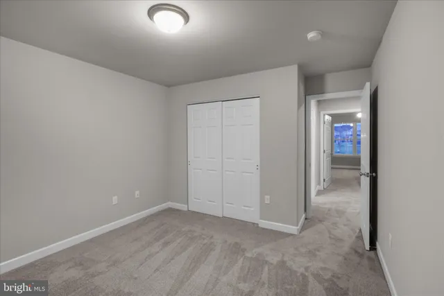 an empty room with an entryway