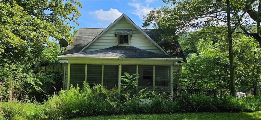 1175 State Rte 1028 Kittanning, PA 16201 - Photo 3 of 22 a front view of a house with a yard