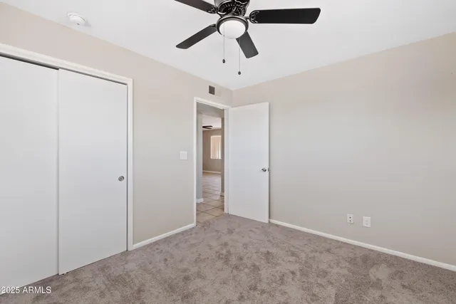 a kitchen with a sink a stove top oven and cabinets