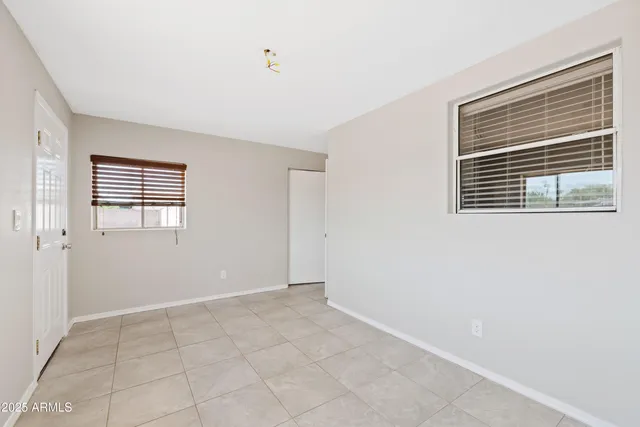 a utility room with sink washer and dryer