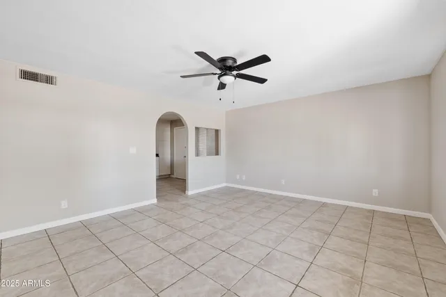 a view of a kitchen with a sink and cabinets