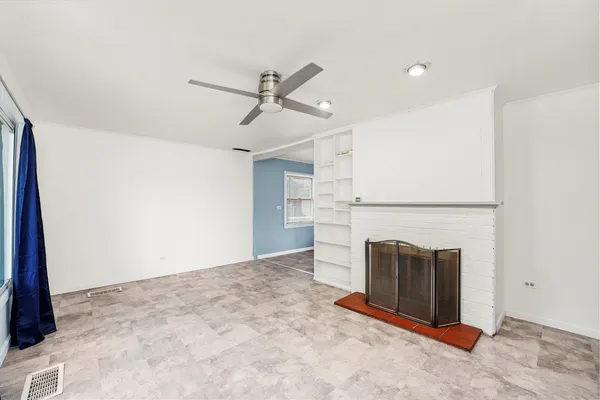 a view of a livingroom with a fireplace