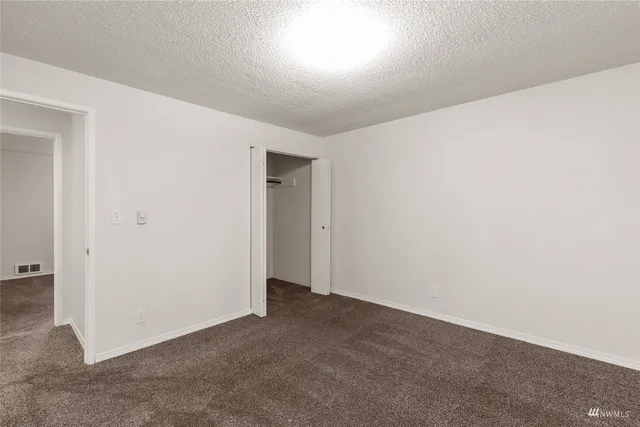 an empty room with an entryway
