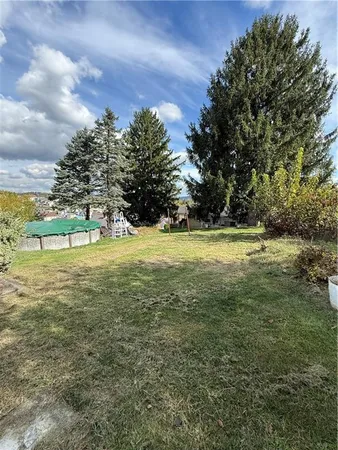 a view of an outdoor space and a yard