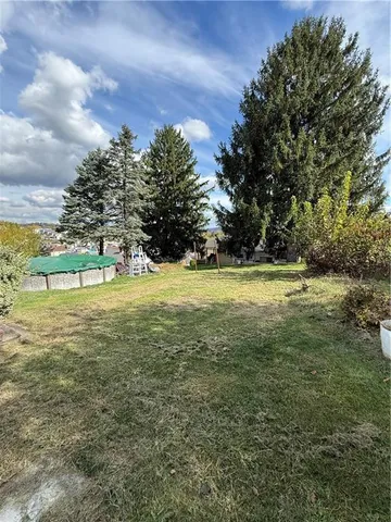 a view of an outdoor space and a yard