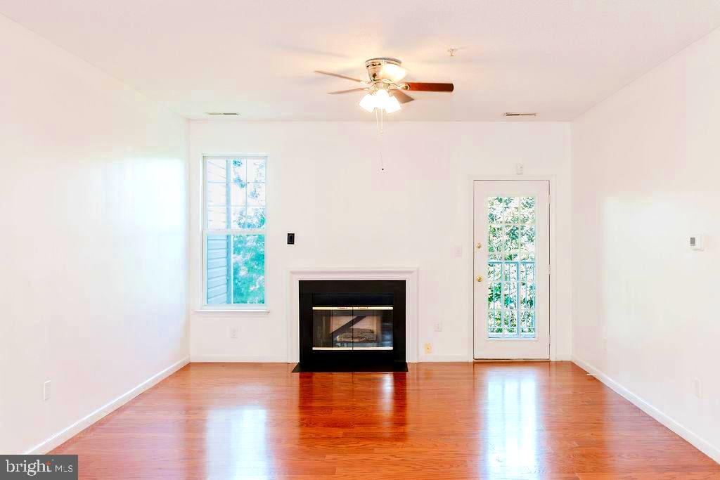 7205 Bogley Road, Unit 202 Baltimore, MD 21244 - Photo 13 of 39 Living room / Fireplace