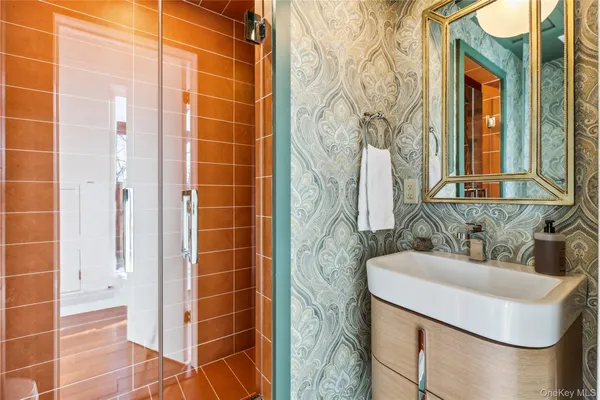 a room with wooden floor and furniture