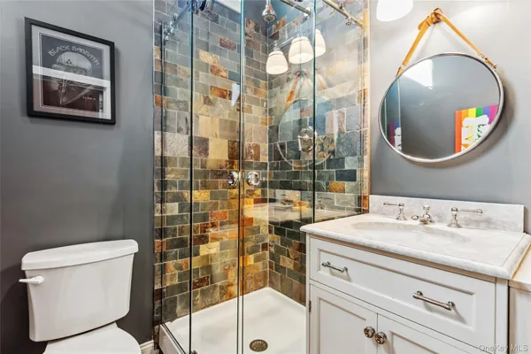 a front view of a house with a yard table and chairs