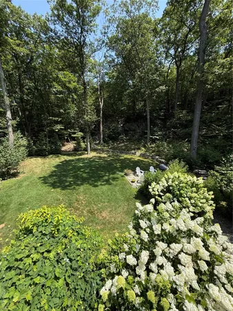 a view of a garden with an outdoor space