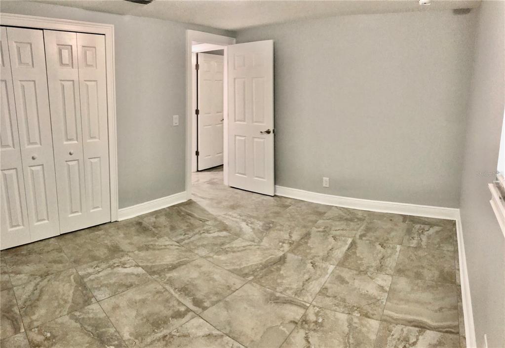 11001 Riverview Drive Riverview, FL 33578 - Photo 5 of 8 a view of an empty room