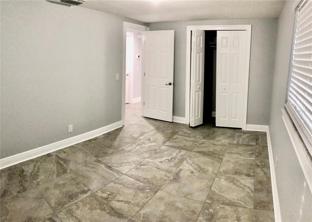 11001 Riverview Drive Riverview, FL 33578 - Photo 6 of 8 a view of room with window